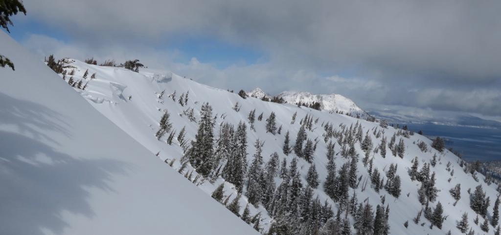  Large <a href="/avalanche-terms/cornice" title="A mass of snow deposited by the wind, often overhanging, and usually near a sharp terrain break such as a ridge. Cornices can break off unexpectedly and should be approached with caution." class="lexicon-term">cornices</a> looming over the Corkscrew <a href="/avalanche-terms/avalanche" title="A mass of snow sliding, tumbling, or flowing down an inclined surface." class="lexicon-term">slide</a> path. Very small natural loose snow <a href="/avalanche-terms/avalanche" title="A mass of snow sliding, tumbling, or flowing down an inclined surface." class="lexicon-term">slides</a> observed near these <a href="/avalanche-terms/cornice" title="A mass of snow deposited by the wind, often overhanging, and usually near a sharp terrain break such as a ridge. Cornices can break off unexpectedly and should be approached with caution." class="lexicon-term">cornices</a>. 