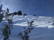 Wind scoured snow on an E aspect at 9800 ft. 