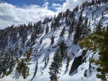 Overview photo. There is a lower crown at the lower rocks/convexity near climber's left flank.