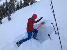 Snowpit tests on a small wind-loaded test slope. ECTX