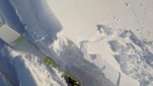 Small cornice peices broke with a ski kick above a wind-loaded test slope on the Castle Peak Ridge