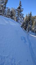 Cornice pieces dropped onto a wind-loaded test slope did not trigger cracking or other signs of instability.