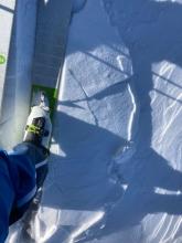 New small wind deposits cracking with the weight of a skier