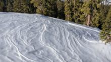 Wind affected surfaces near the ridgeline.