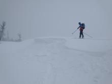 Propagating wind slab failure on one of the many test slopes along our approach.