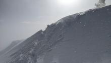 A very small, shallow wind slab on a test slope near the summit of Waterhouse