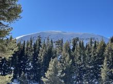 Large overhanging cornice development.