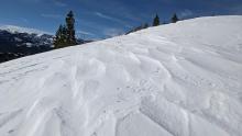 Wind sculpted snow along the ridge