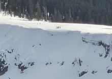 A group of Backcountry skiers standing close to a large cornice South of Mt Lincoln on the Anderson ridge in the sugarbowl Backcountry.