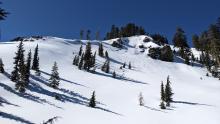 Recent sluffs of cold dry snow on steep terrain.