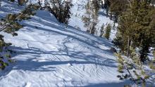 NE wind scoured surfaces on a NE facing slope near a ridge at 9600 ft.