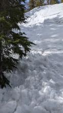 Debris from the ski cut triggered wet loose avalanche.