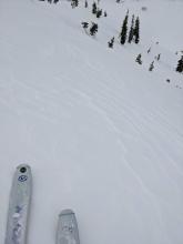 Wind affected snow near the ridgeline.