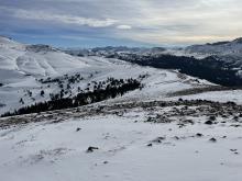 Ridge lines scoured down to rocks.