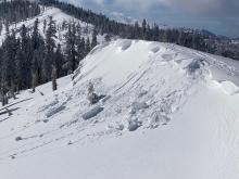 Natural wind slab from cornice collapse at 8000' on E aspect.