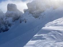 Natural D2 wind slab avalanche on N. Side of Castle Peak.