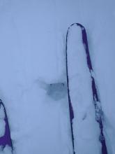 We started to notice cracking and very localized collapsing of the ski track. A quick hand pit showed lower density, F hard snow below.