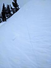 Long shooting cracks on a wind loaded test slope near the trailhead. This slope faced NNW.