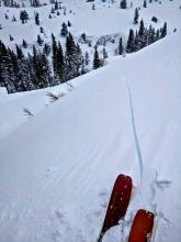 Long shooting cracks on a cross-loaded N facing slope above the standard skin track.  