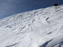 Winds affected snow was widespread on all aspects above treeline.